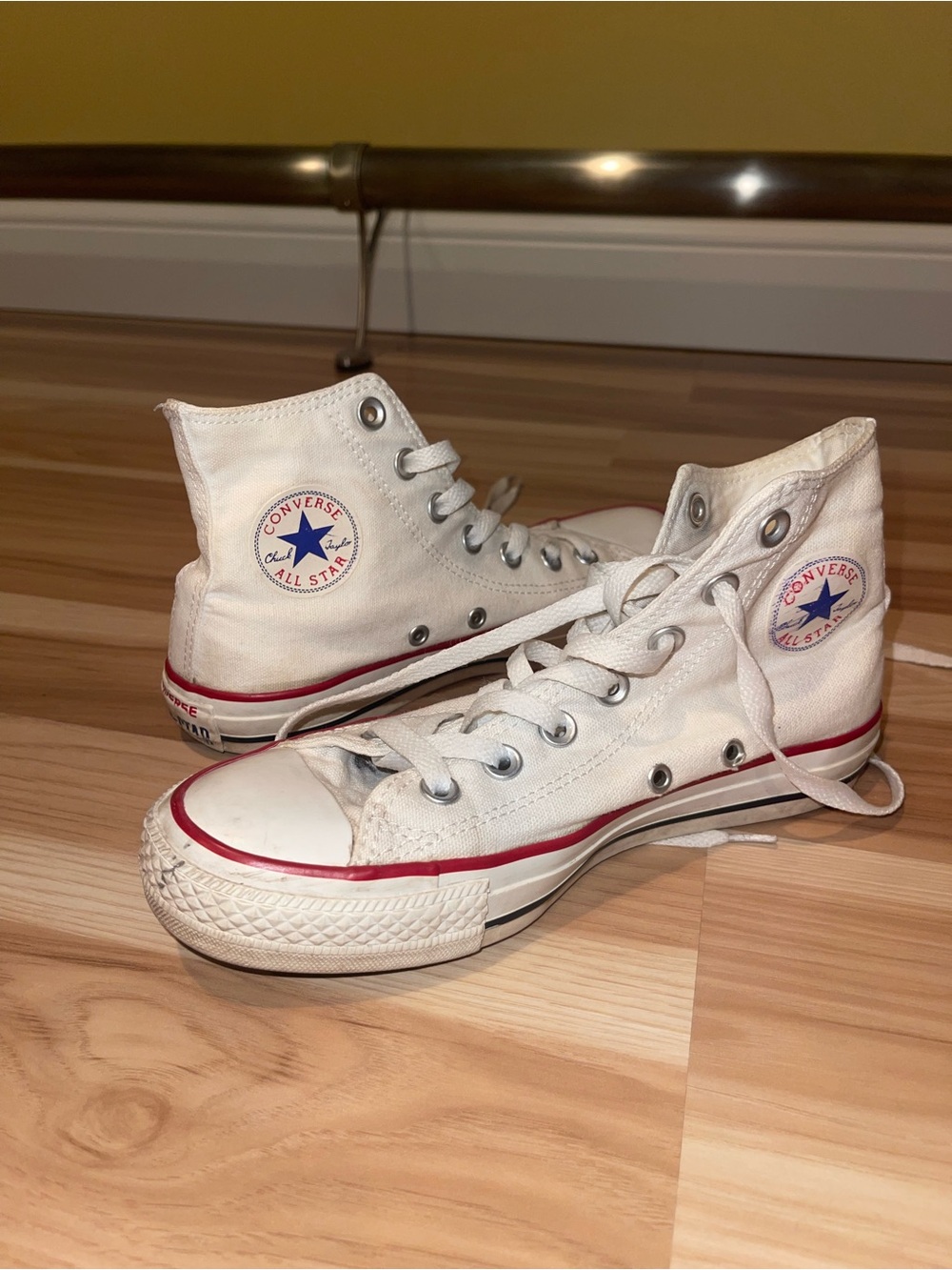 Converse White High Top Chuck Taylor Sneakers with Red Trim